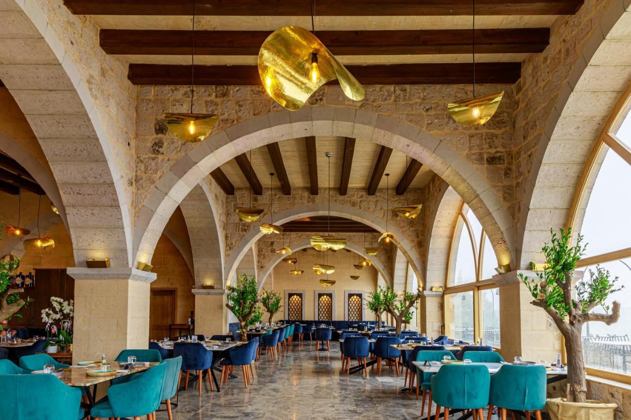 אוצ'יסר Millstone Cave Suites Hotel מראה חיצוני תמונה